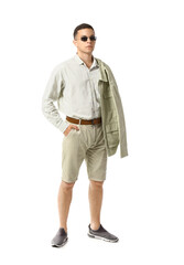 Fototapeta premium Young man in stylish shirt and jacket on white background