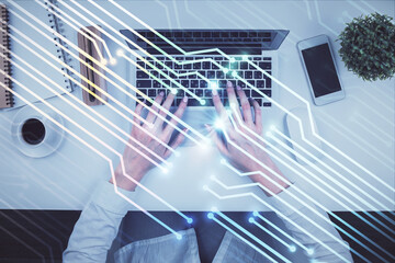 Double exposure of woman hands working on computer and data theme hologram drawing. Top View. Technology concept.