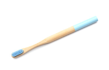 Blue bamboo toothbrush on white background