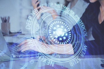 Multi exposure of woman hands working on computer and data theme hologram drawing. Tech concept.