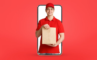 Smiling delivery man holding purchase, standing in smartphone, creative image