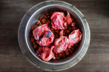 Dog bowl with chicken heads