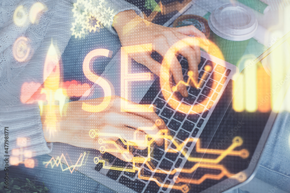 Poster double exposure of woman hands working on computer and seo hologram drawing. internet search concept