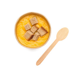 Bowl of tasty pumpkin cream soup on white background