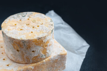 English Stilton cheese with blue mold.