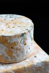 English Stilton cheese with blue mold.