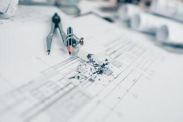 eraser crumbs and compass on drawing design working on bueprint. House planning design and...