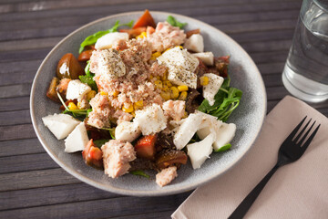 Closeup of salad with fish and vegetables for lunch