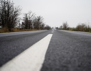 road. it was coming in a straight line for a distance of 20 km. photo during the day.