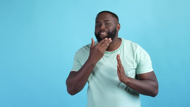 Stylish guy touch face prepare event isolated blue color background