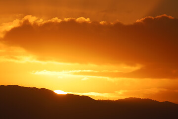 Beginning of sunrise over hills near Santa Cruz, California. 