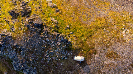Drone photo of tent in the mountains