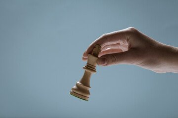 Player holding a chess piece