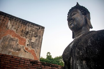 Old big Buddha statue at Wat Si Chum. Temple in Sukhothai historical park
