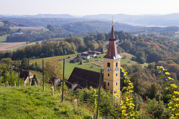 Fototapeta na wymiar the idyllic church kapfenstein in the oststeiermark region in Austria