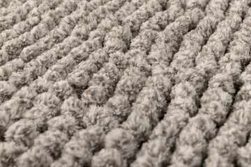 Gray chenille soft bath mat texture background. Bath Accessories. Top view.