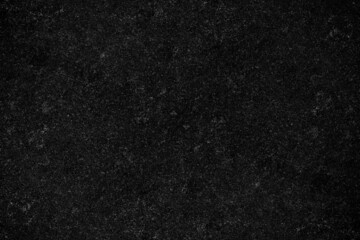 Dark gray old cement plaster wall with heavy grunge texture for background