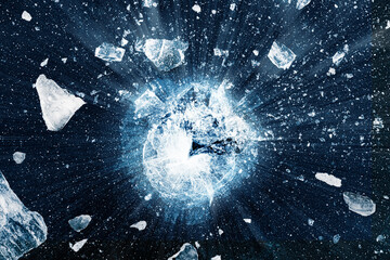 Shattered ice background. Crushed ice pieces spread away from the center in black background. - 477994901