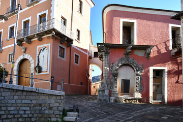 Fototapeta na wymiar A small street between the old houses of Pignola, a small town in the province of Potenza in Basilicata, Italy.