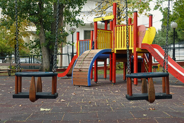 playground swings and play structure equipment with slides