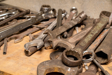 wrenches for screws in a mess in the workshop