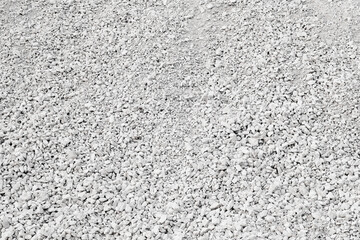 Crushed stone, small granite stones.