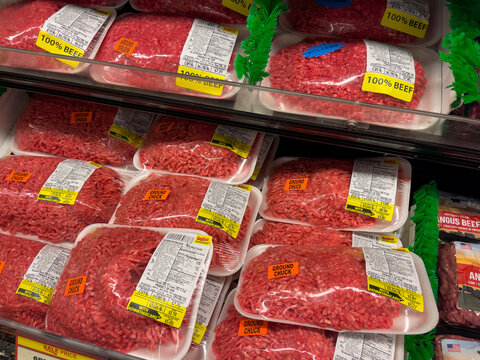 NORTH PORT, FLORIDA - January 02, 2022 : Fresh ground beef hamburger meat in a refrigerated display case at a grocery store supermarket.