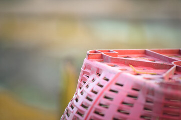 Gardener's red basket with natural background