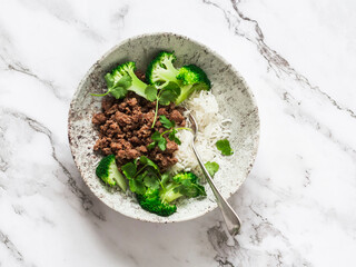 Ground beef, basmati rice, broccoli and cilantro - delicious asian style lunch on a light...