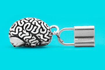 Human brain with a padlock isolated on blue