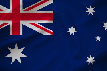 Australia flag on waving silk background. Fabric texture.