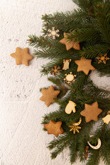 Christmas background cookies and tree branches, happy new year decoration 