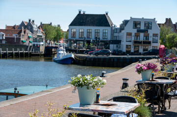 Walking on old streets of Harlingen fisherman town on Wadden sea, Friesland, Netherlands © barmalini