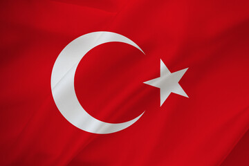 Turkish flag on waving silk background. Fabric texture design. National symbol of Turkey.