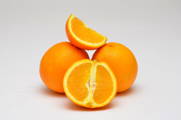 fresh juicy oranges half fruit close-up