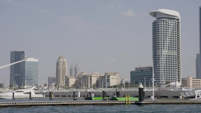 Dubai Boat Moorings at Marina Entrance with City in Background