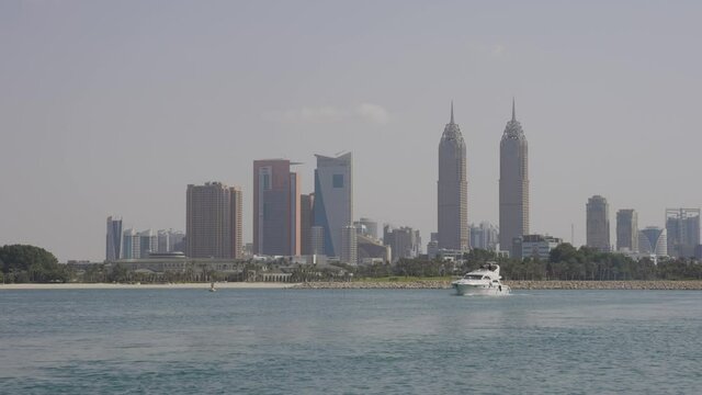 Dubai Midtown Skyline with Yacht Passing