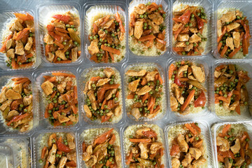 food delivery in the restaurant. Business lunch in an eco-friendly plastic container, ready for delivery. View from above. Office Lunch boxes with rice meals. Food is taken away. Meals,