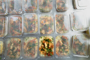 food delivery in the restaurant. Business lunch in an eco-friendly plastic container, ready for...