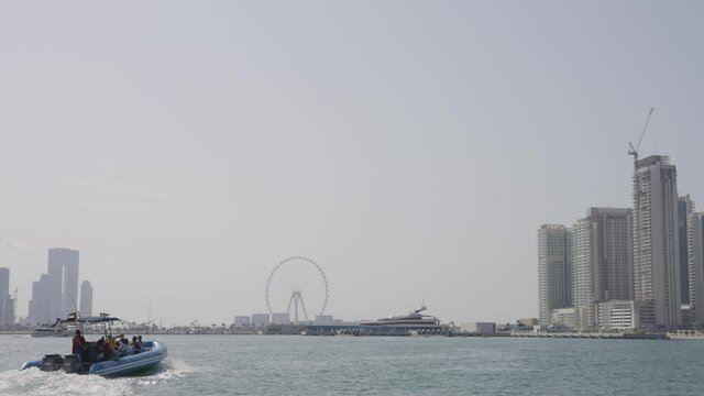 Speedboat Heading Towards Dubai Eye and the Marina