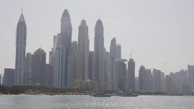 Dubai Marina Skyline from the Sea with Boats in the Foreground