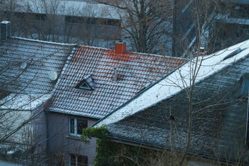 Slightly snow-covered roofs