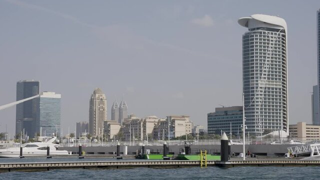 Dubai Boat Moorings at Marina Entrance with City in Background