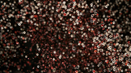 Freeze Motion Shot of Flying Colored Peppers Balls