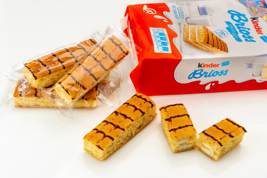 Alba, Italy - December 28, 2021: package of Kinder Brioss Ferrero, snack sponge cake ripieni di crema al latte  produced by Ferrero important confectionery factory in the world