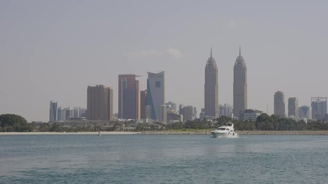 Dubai Midtown Skyline with Yacht Passing