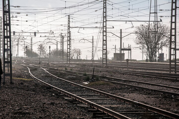 Old train tracks forgotten on a foggy day