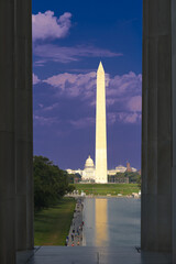 Obraz premium Washington DC monuments including the Capitol and Washington Monument as seen between columns of Lincoln Memorial