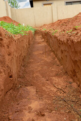 Selective focus on a foundation that was dug to build a new house