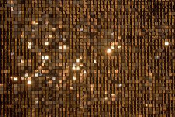 Beautiful abstract sparkles glitter background. Glittering sequins on the wall - obrazy, fototapety, plakaty